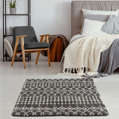 Gray and white geometric patterned moroccan dark grey shaggy rug with a soft plush texture perfect for living rooms