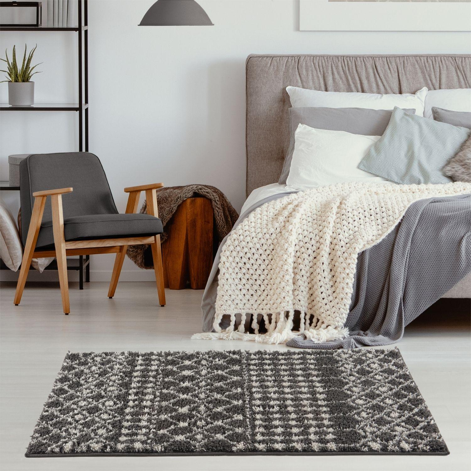 Gray and white geometric patterned moroccan dark grey shaggy rug perfect as a cozy dark grey shaggy floor accent