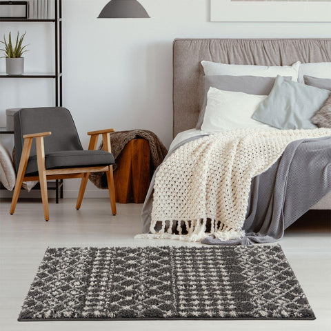 Gray and white geometric patterned moroccan dark grey shaggy rug perfect as a cozy dark grey shaggy floor accent