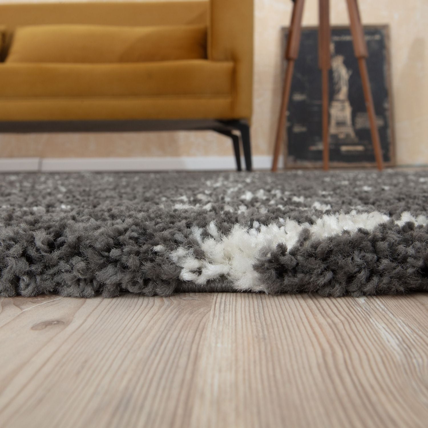 A plush moroccan dark grey shaggy rug with a soft textured surface and shaggy grey fibers for cozy comfort