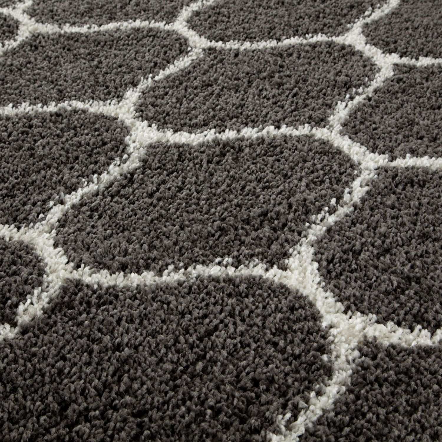 Moroccan dark grey shaggy rug with a white geometric honeycomb pattern perfect for cozy living spaces