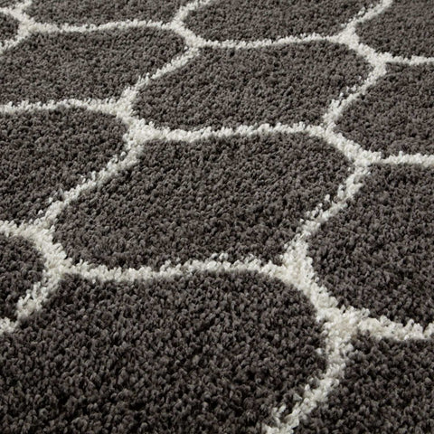 Moroccan dark grey shaggy rug with a white geometric honeycomb pattern perfect for cozy living spaces