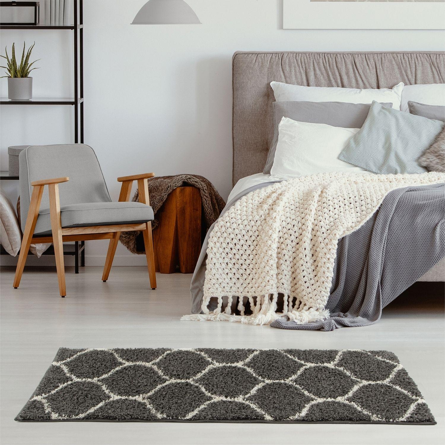 Gray and white geometric-patterned moroccan dark grey shaggy rug with soft plush texture for cozy living spaces