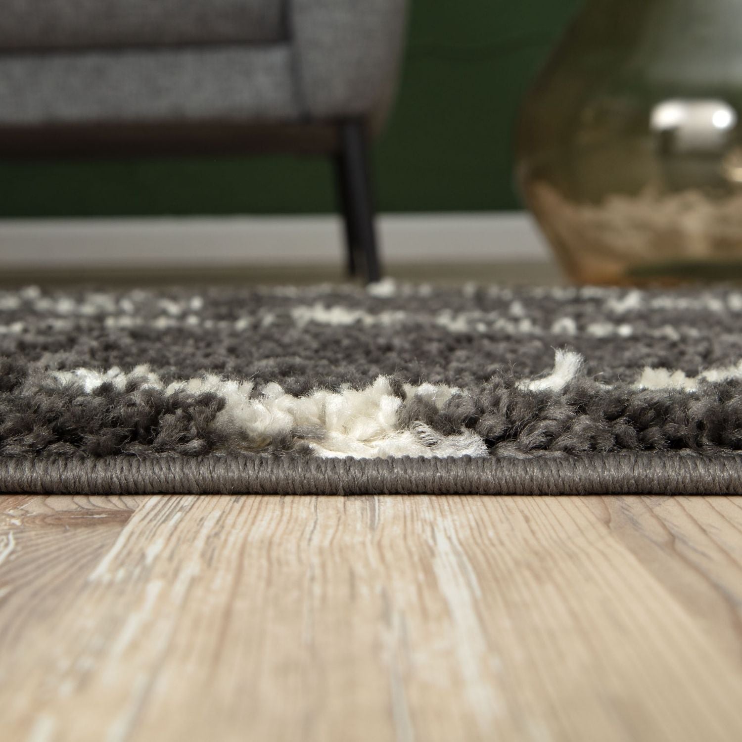 Moroccan dark grey shaggy rug with plush textured surface and a mix of gray and white fibers for cozy living spaces