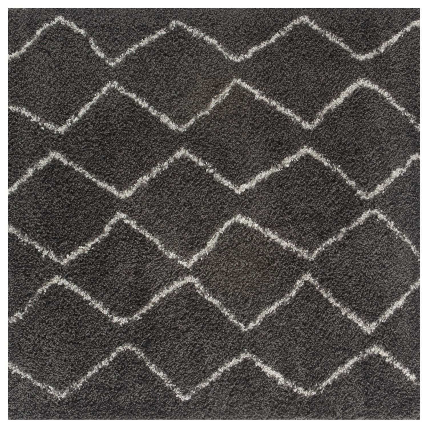 Moroccan dark grey shaggy rug with a geometric white zigzag pattern perfect for cozy living spaces