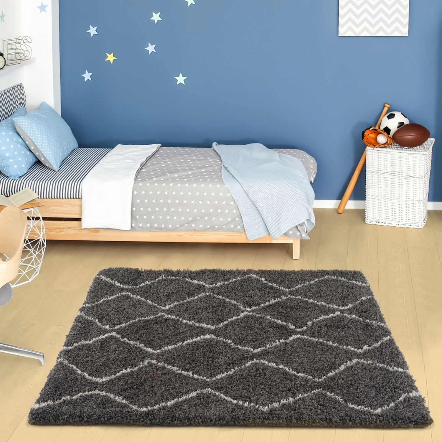 Moroccan dark grey shaggy rug with a geometric diamond pattern in lighter grey accents for cozy living spaces