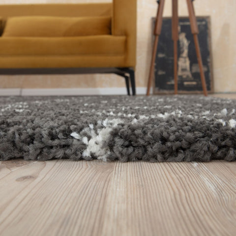 Plush moroccan dark grey shaggy rug with gray and white textured surface perfect for cozy living spaces