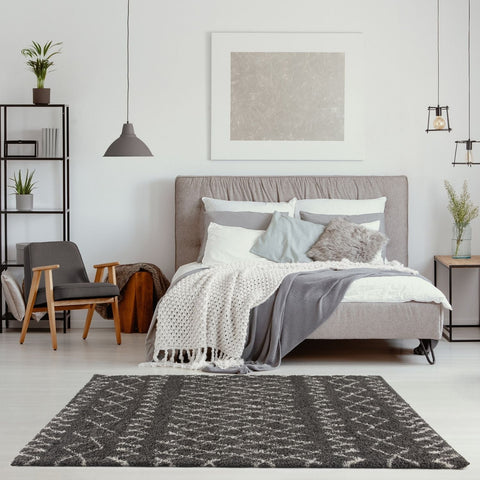 Moroccan dark grey shaggy rug with geometric pattern in darker grey and white tones for cozy spaces