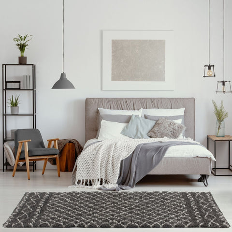 Gray textured rug with a geometric pattern in moroccan dark grey shaggy style ideal for cozy living spaces