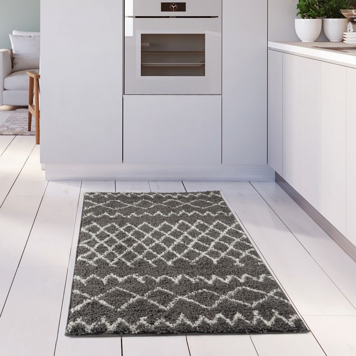 Moroccan dark grey shaggy kitchen rug with gray and white geometric pattern perfect for cozy floors
