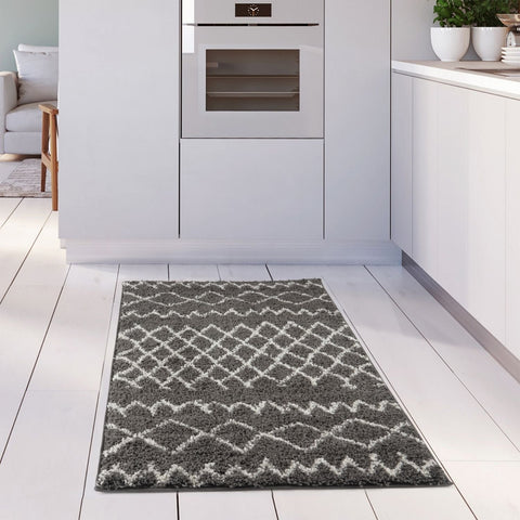 Moroccan dark grey shaggy kitchen rug with gray and white geometric pattern perfect for cozy floors