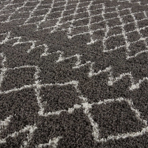 Moroccan dark grey shaggy rug with grey and white geometric pattern perfect as a cozy dark grey shaggy carpet
