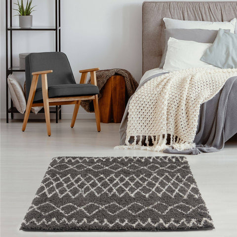 Moroccan dark grey shaggy rug with a white geometric diamond pattern perfect for cozy living spaces