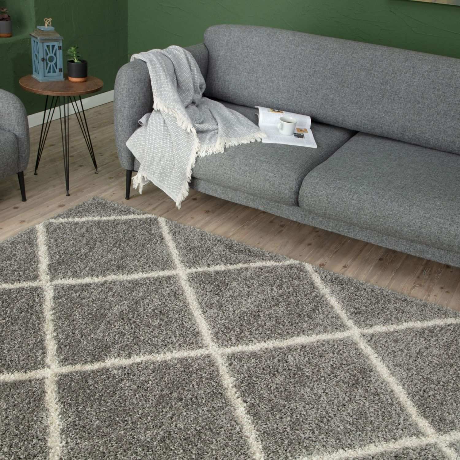 Moroccan grey shaggy rug with a geometric diamond pattern outlined in cream lines for cozy living spaces