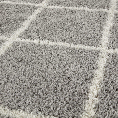Moroccan grey shaggy rug with soft textured plush surface and white geometric grid pattern in grey shaggy rug style