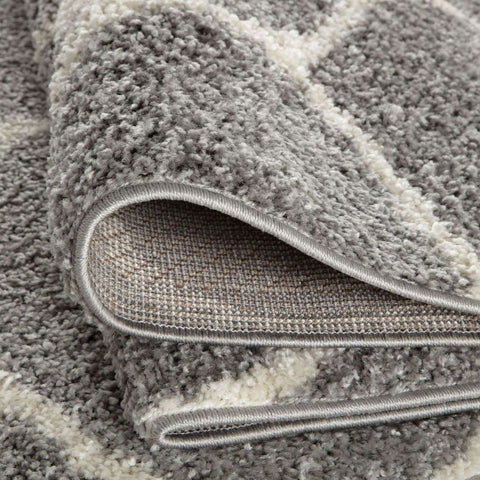 Moroccan grey shaggy rug with soft plush texture gray and white colors and neatly finished edges for cozy spaces