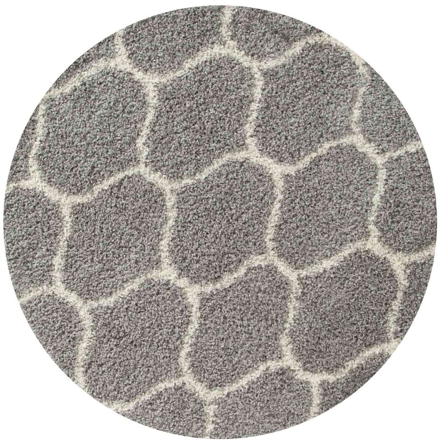 Moroccan grey shaggy rug with a fuzzy textured surface and off-white honeycomb pattern in grey tones