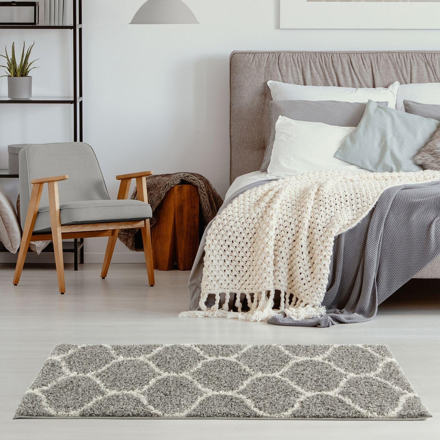 Moroccan grey shaggy rug with a cream geometric pattern adds cozy style to any room