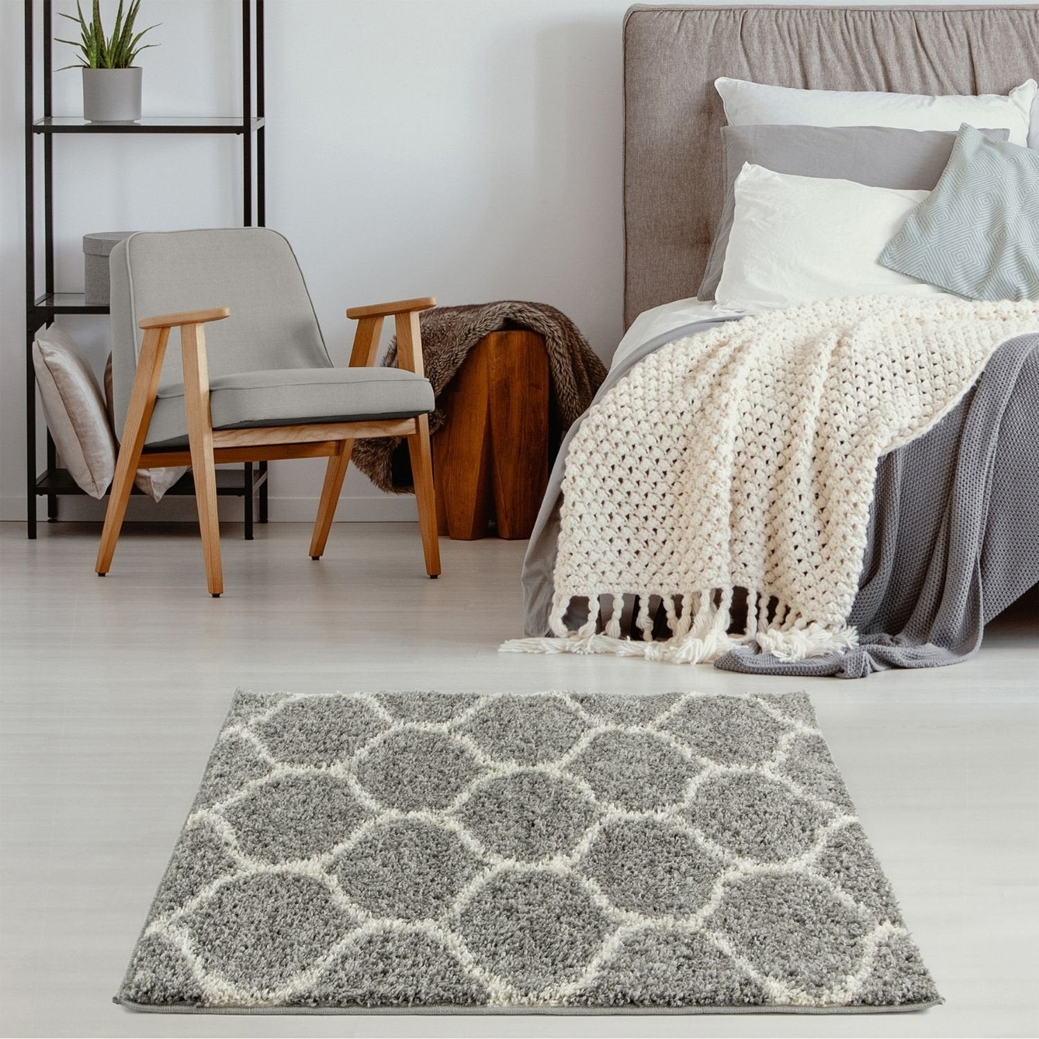Moroccan grey shaggy rug with a grey and white geometric honeycomb pattern perfect for cozy living spaces