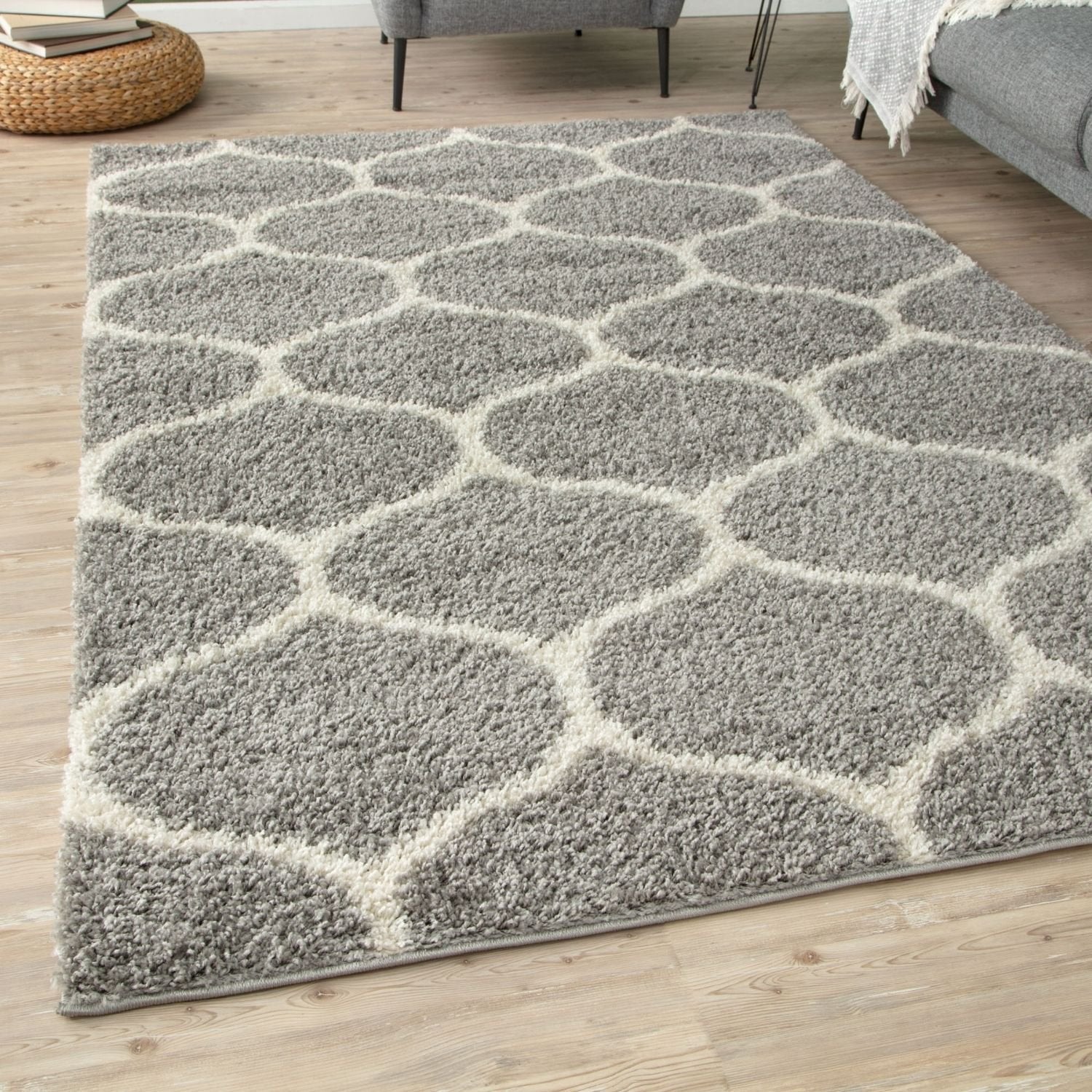 A plush moroccan grey shaggy rug with cream geometric pattern and soft textured pile for cozy spaces