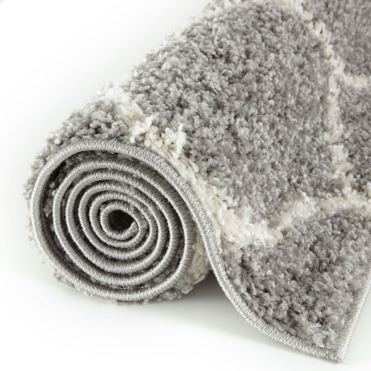 A plush moroccan grey shaggy rug 610 with soft textured surface in gray and white for cozy home decor