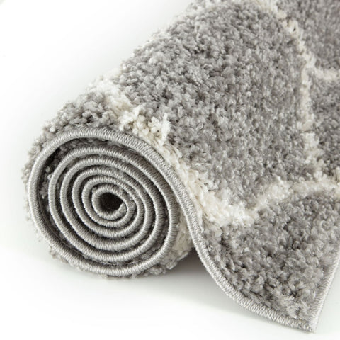 A plush moroccan grey shaggy rug 610 with soft textured surface in gray and white for cozy home decor