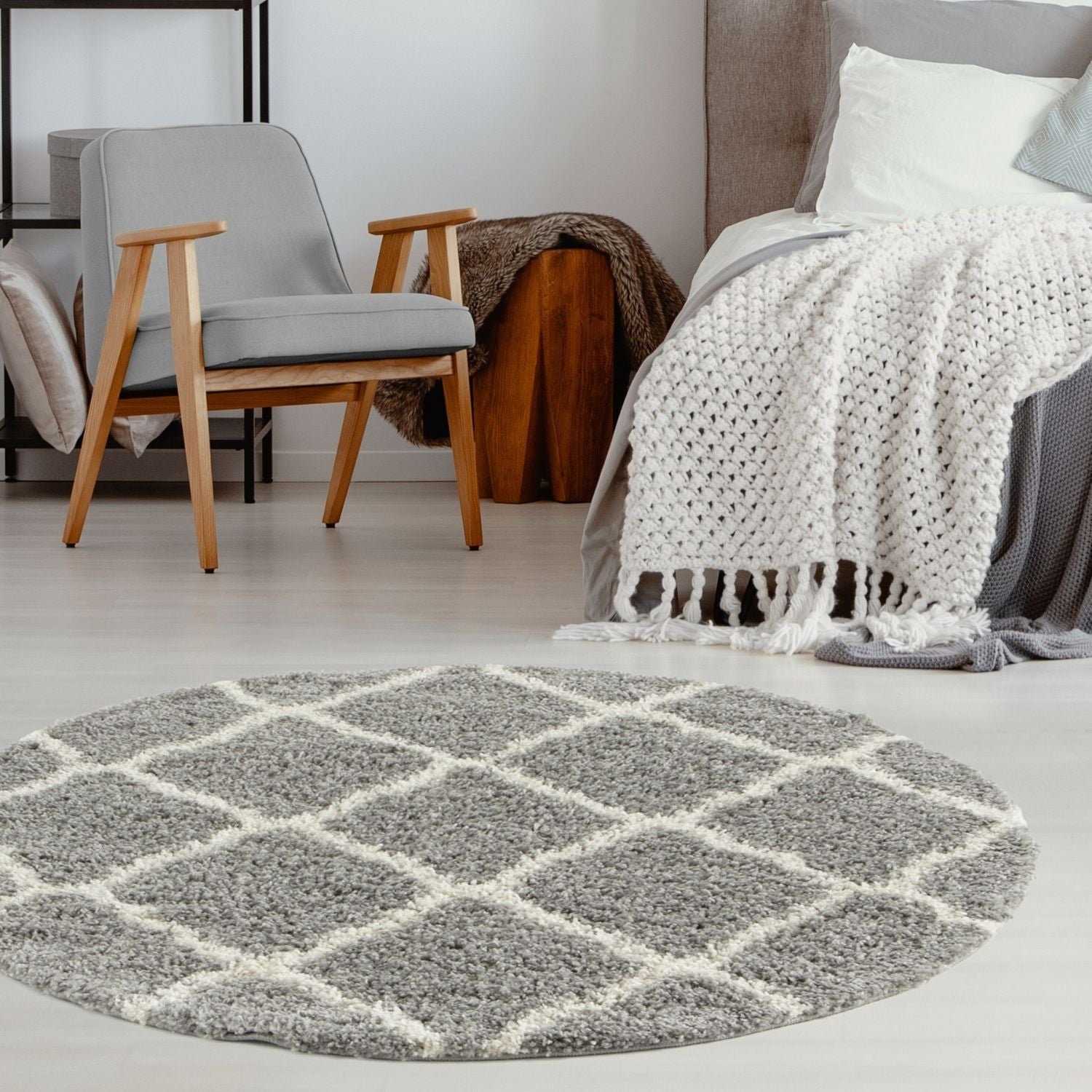 Moroccan grey shaggy circular rug with textured shag surface and cream diamond grid pattern for cozy spaces