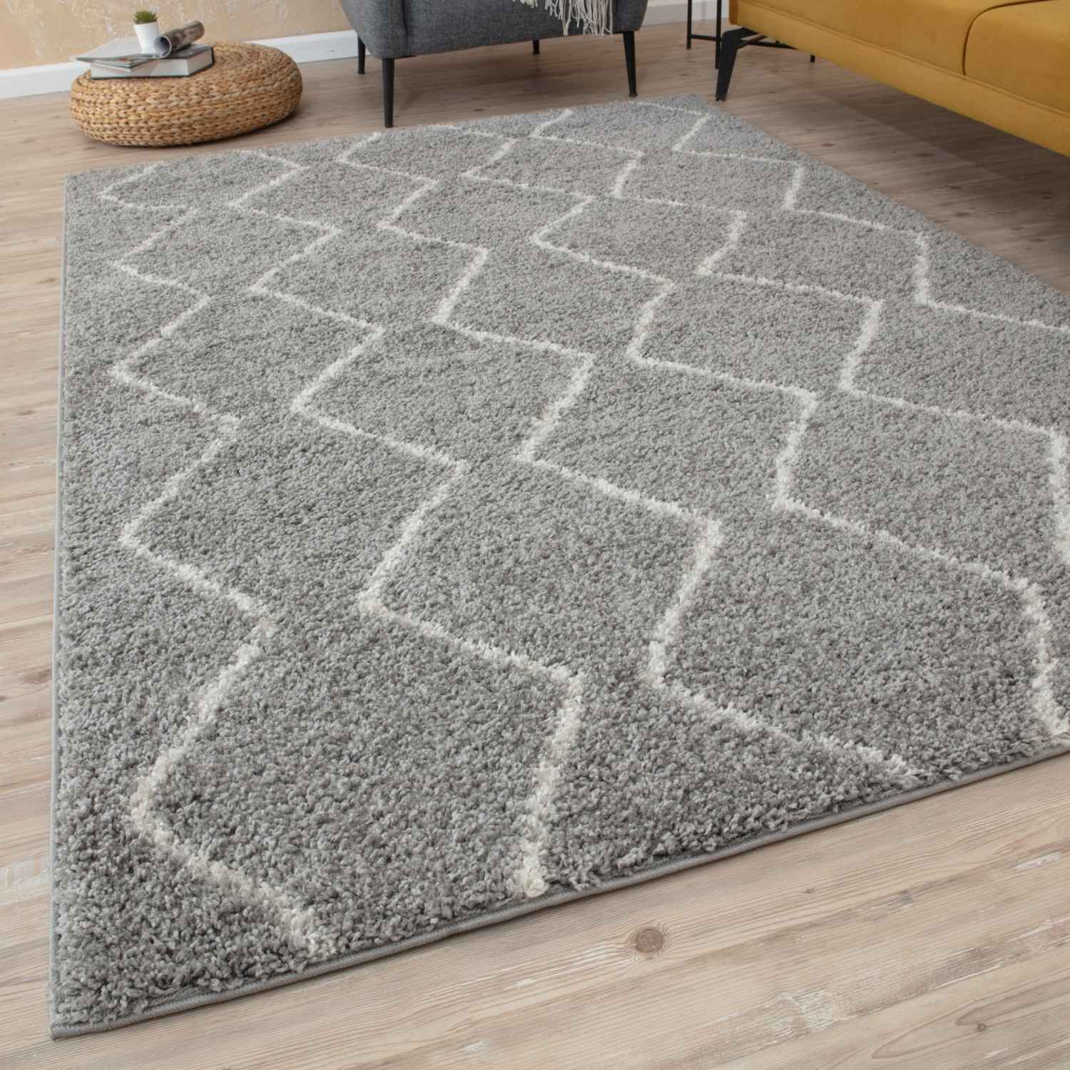 Moroccan grey shaggy rug with soft grey pile and off-white geometric diamond pattern for cozy home decor