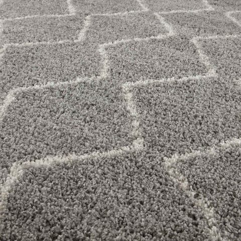 Moroccan grey shaggy rug with a soft shaggy texture and subtle off-white geometric pattern for cozy spaces