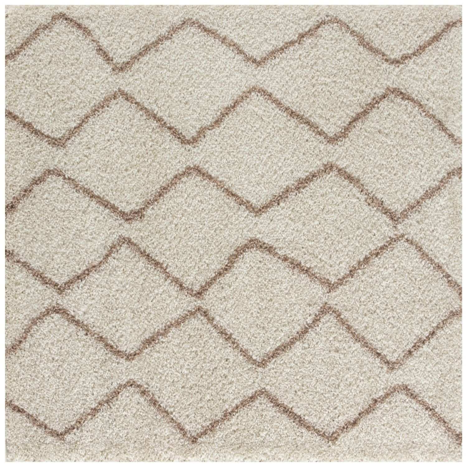 Moroccan ivory beige shaggy rug with plush textured surface and beige taupe zigzag pattern for cozy living spaces