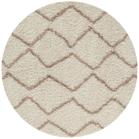Moroccan ivory beige shaggy rug with a beige circular textured surface and brown zigzag geometric pattern