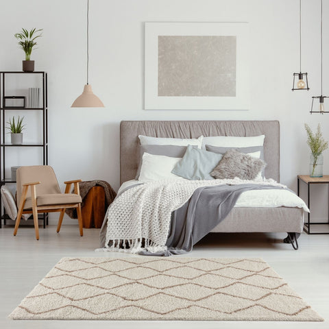 Beige shaggy rug with geometric diamond pattern in moroccan ivory beige textured shaggy surface perfect for cozy spaces