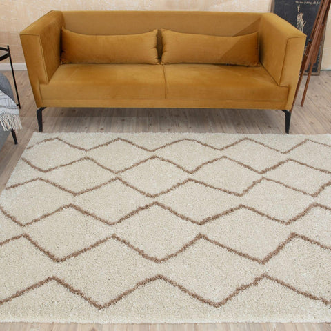 Moroccan ivory beige shaggy rug with cream color and brown geometric zigzag pattern perfect for cozy spaces