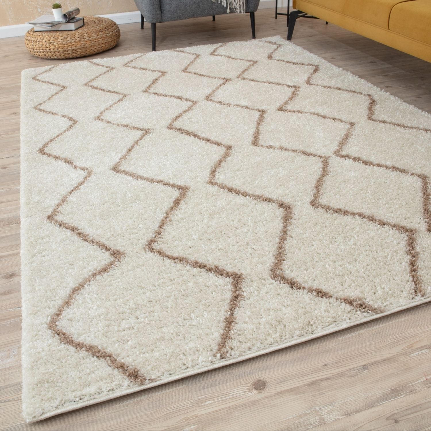 Moroccan ivory beige shaggy rug with cream color and muted brown geometric zigzag pattern for cozy floors