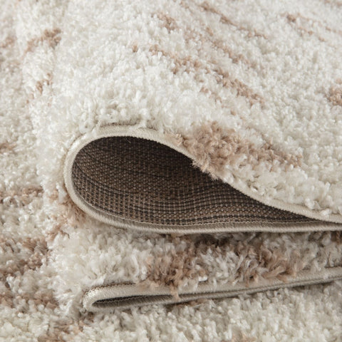Cream and beige moroccan ivory beige shaggy rug with plush textured surface perfect for cozy living spaces