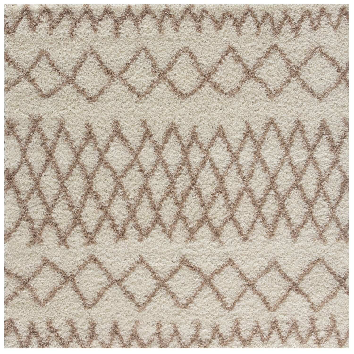 Moroccan ivory beige shaggy rug with a soft textured surface and beige taupe geometric pattern