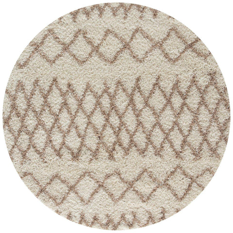 Beige shaggy rug with a textured geometric diamond pattern in muted brown moroccan ivory beige style