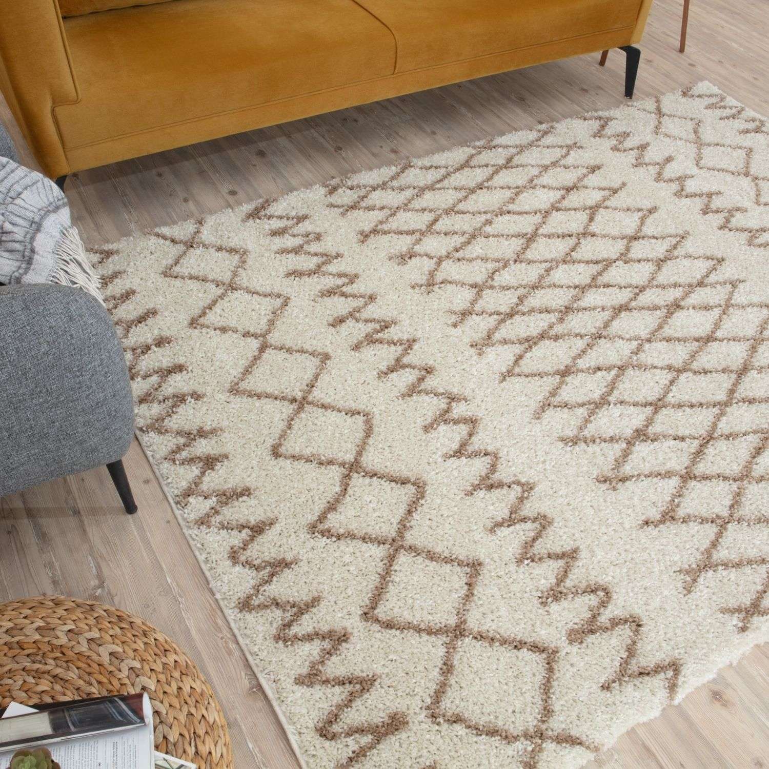Moroccan ivory beige shaggy rug with a cream color and muted brown geometric pattern for cozy spaces