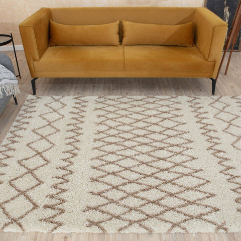 Moroccan ivory beige shaggy rug with cream color and muted brown geometric diamond pattern perfect for cozy spaces