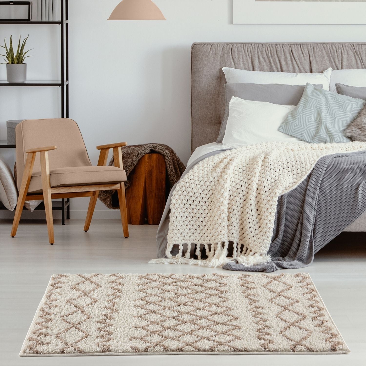 Moroccan ivory beige shaggy rug with beige and gray geometric pattern and plush textured surface