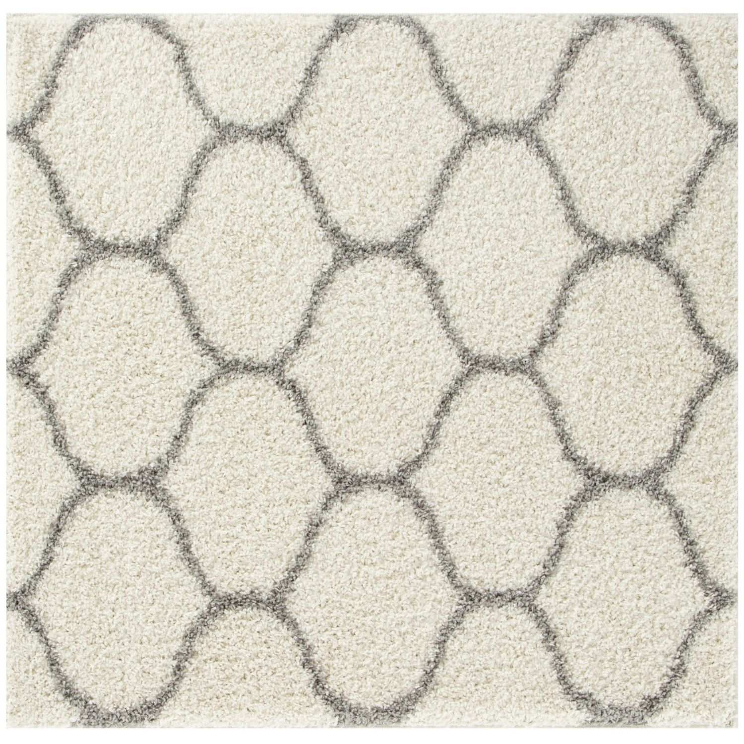 Moroccan ivory shaggy rug with a cream-colored soft textured surface and muted gray geometric pattern