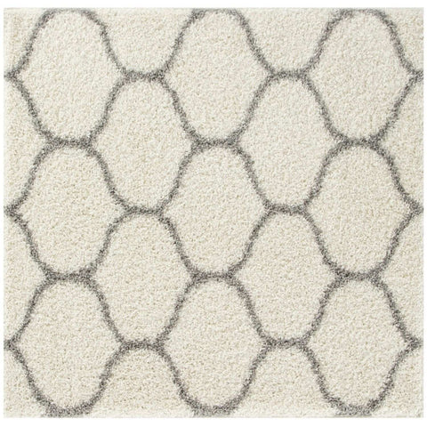 Moroccan ivory shaggy rug with a cream-colored soft textured surface and muted gray geometric pattern