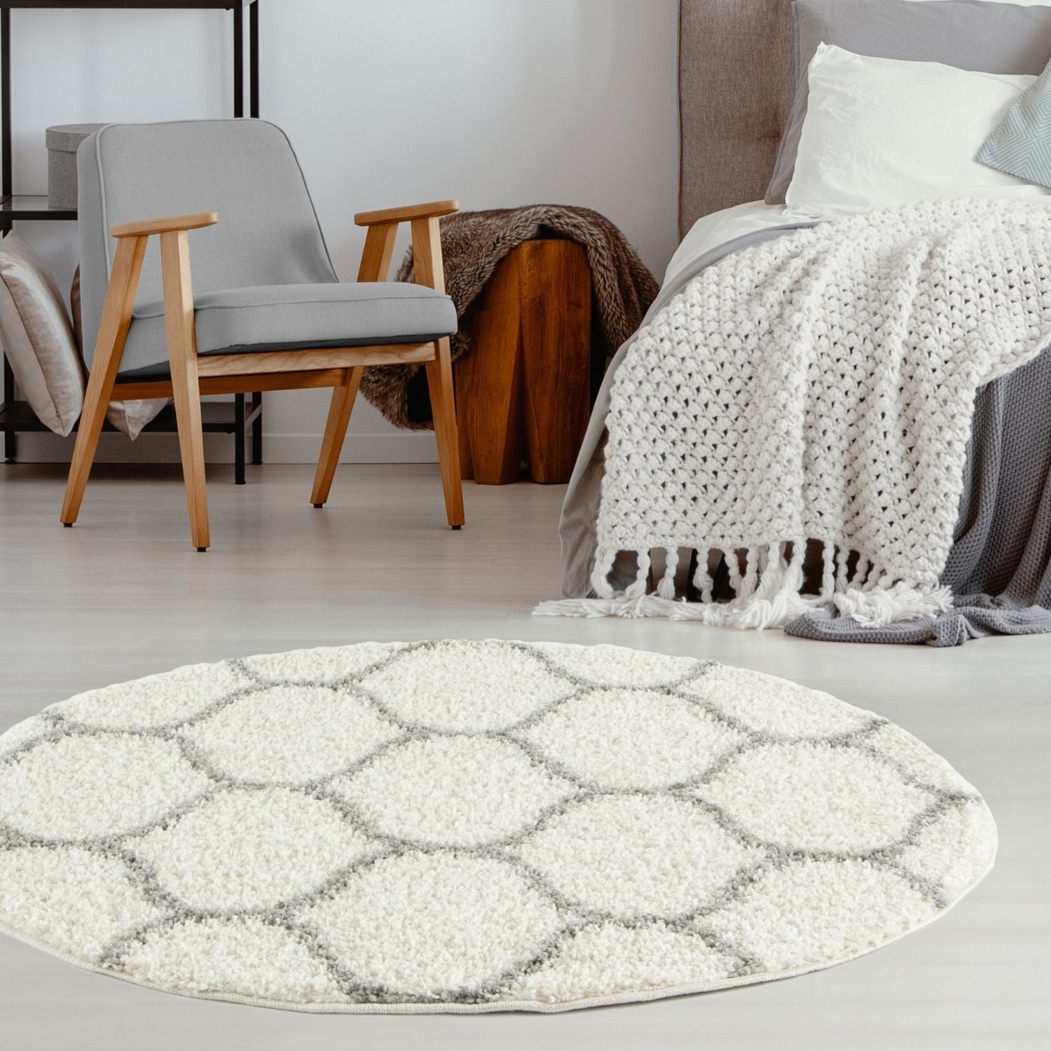Moroccan ivory shaggy rug with cream plush circular design and soft gray geometric hexagonal pattern