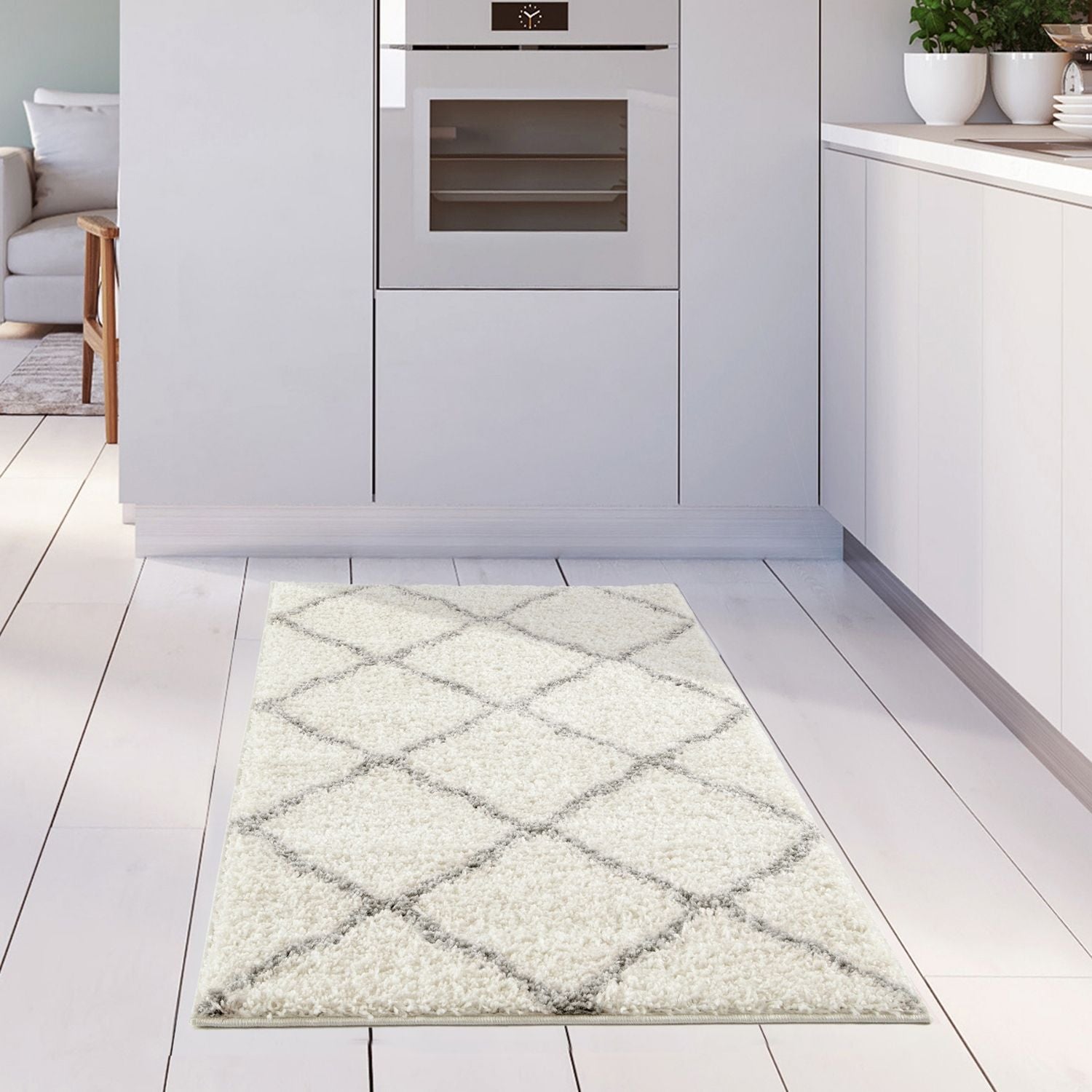Moroccan ivory shaggy rug featuring a cream-colored shaggy texture with a gray geometric diamond pattern