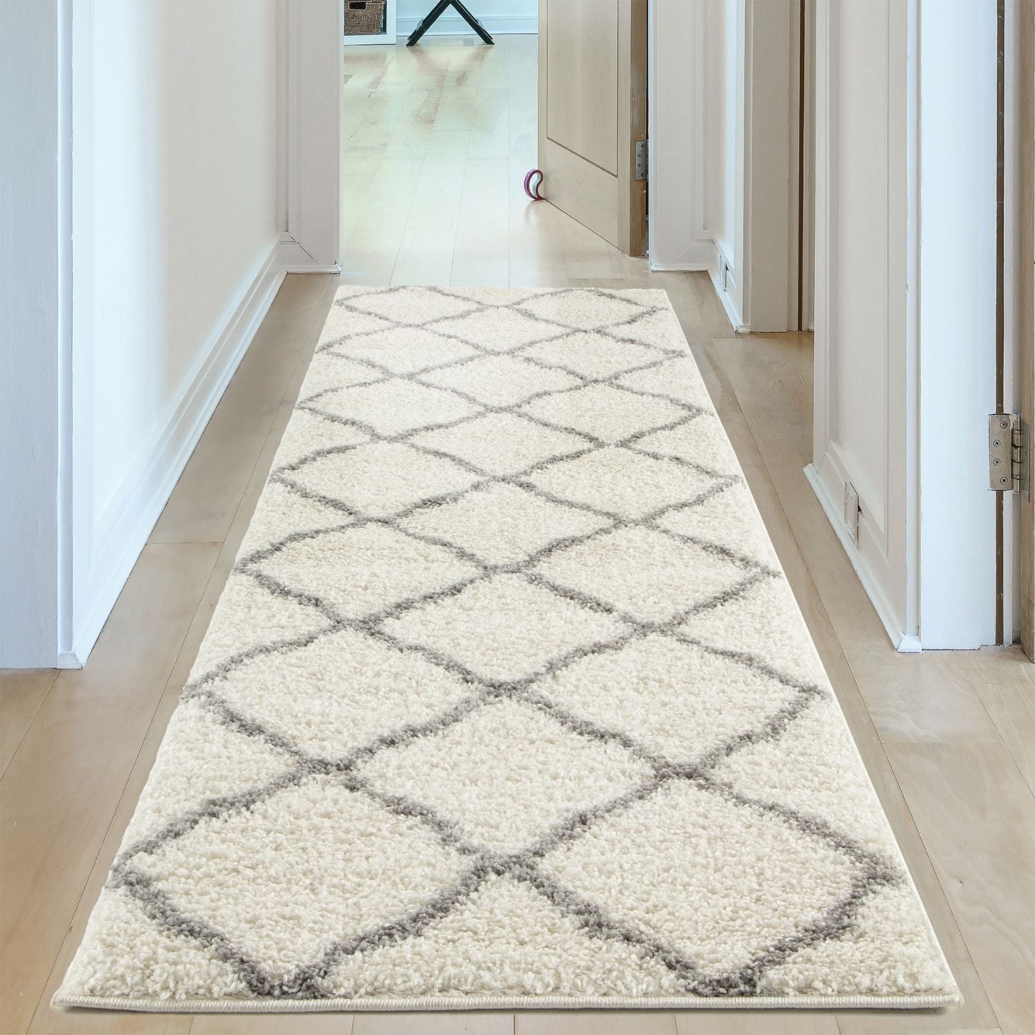 Moroccan ivory shaggy runner rug in cream with a gray geometric diamond pattern perfect for cozy spaces