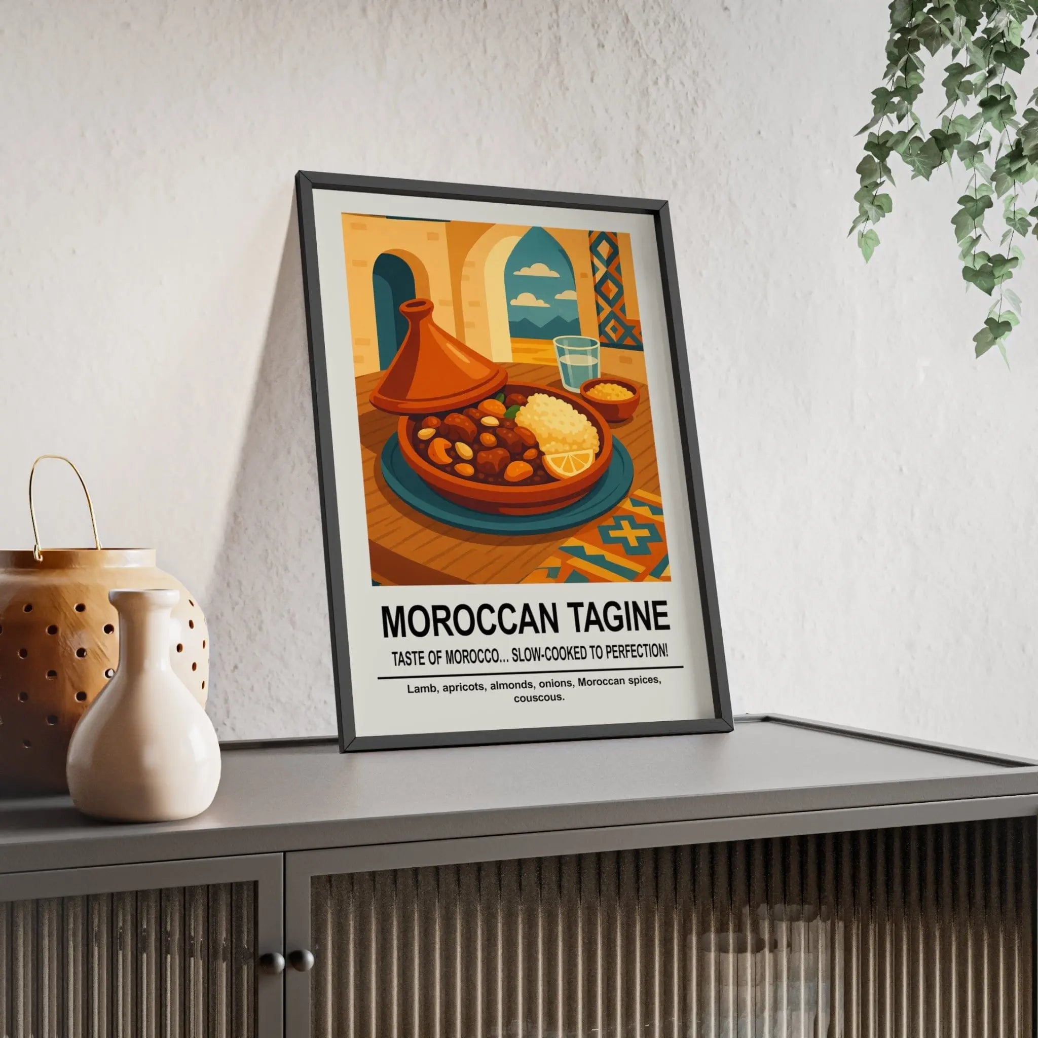 A framed moroccan tagine wall art with vibrant orange and teal tones perfect for kitchen wall decor