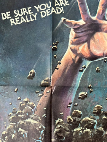 A horror movie poster showing a hand reaching through floating asteroids with bold white text from mortuary 1983