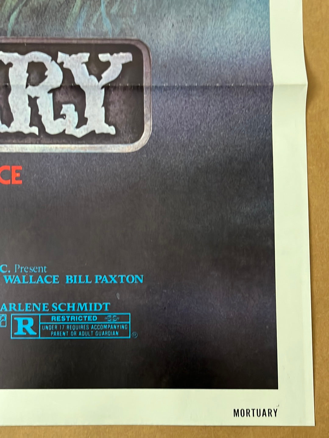 Dark textured horror movie poster for mortuary 1983 with white stylized lettering and red rating label 27x41 inches