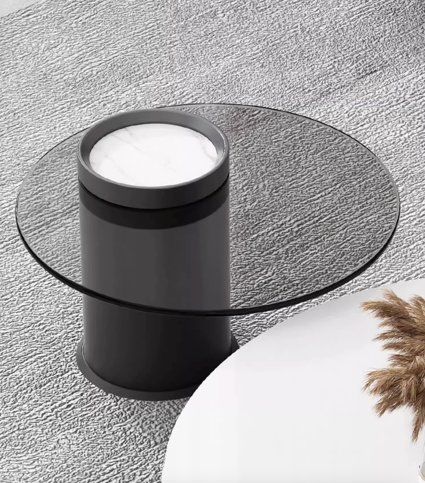 Black cylindrical coffee table with clear glass top and white marble insert from mosaic round nesting set