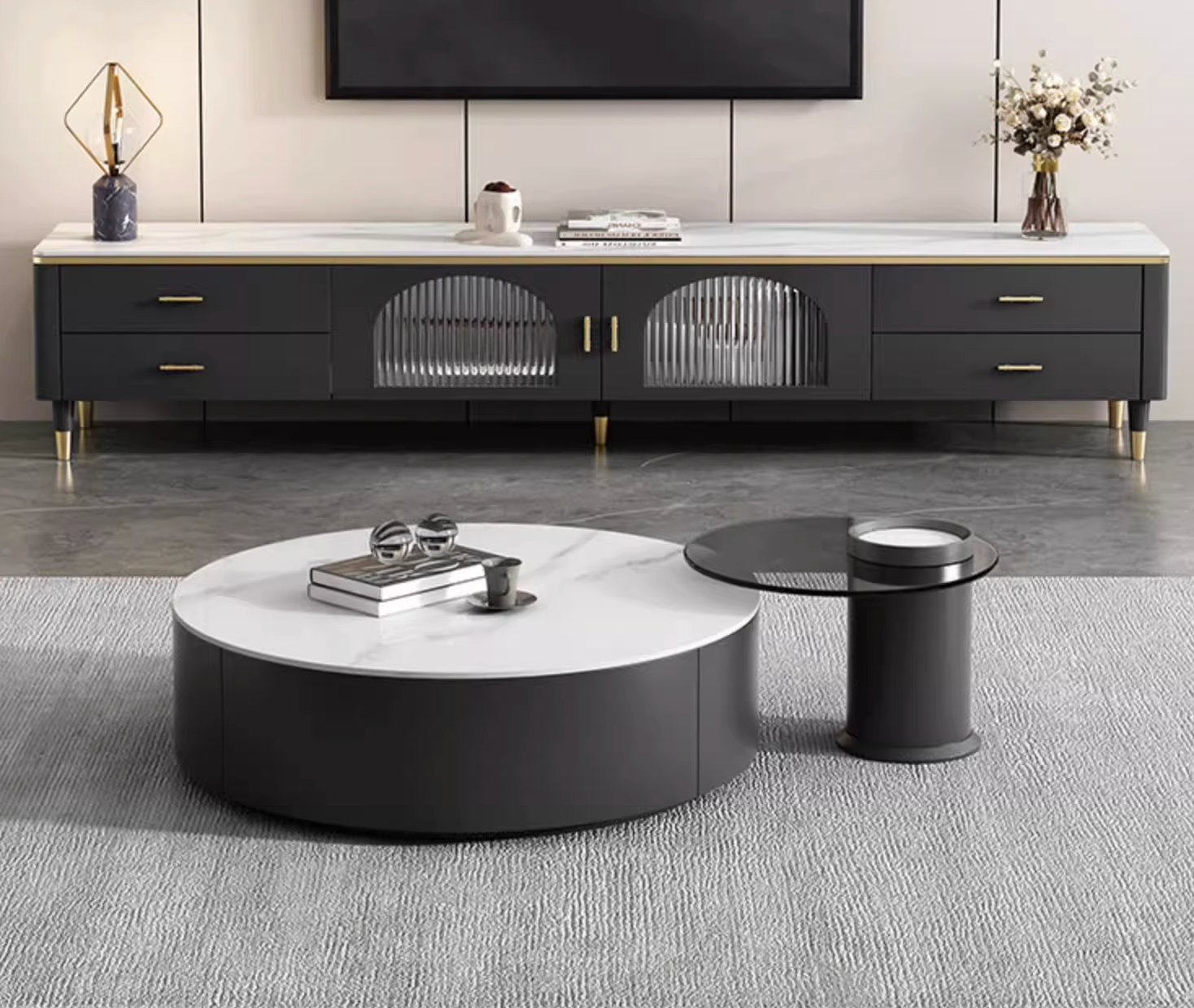Black and white marble-top round nesting coffee table with gold-tone legs from the mosaic set with ottoman